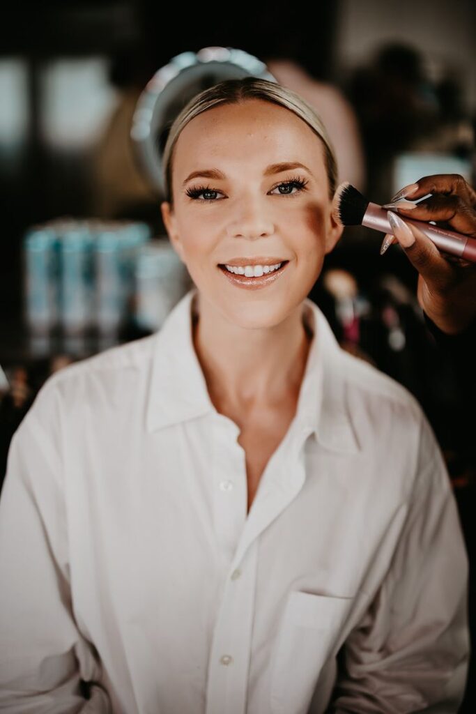 Bride gets her make up done before her wedding in the Virgin Islands